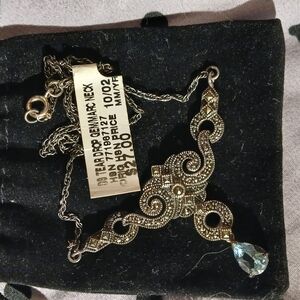 Elegant Silver and Gold Pendant Necklace